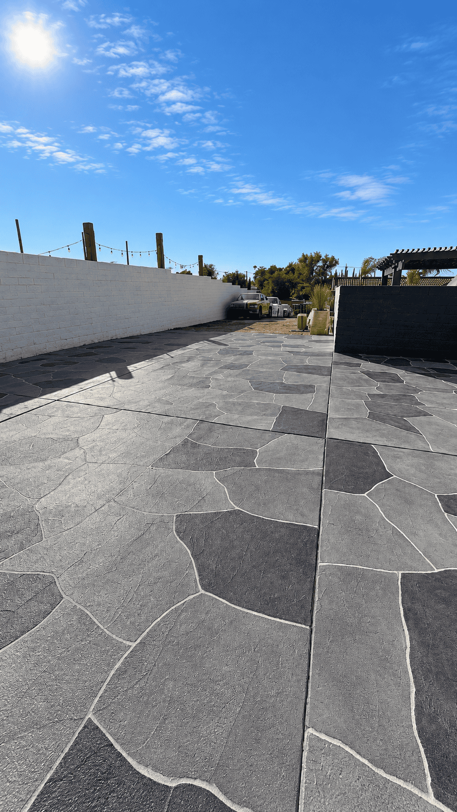 Outdoor patio with stone flooring installed by Ramos Carpet Installation Inc.